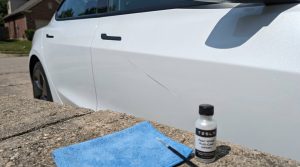 tesla exterior paint scratch repair