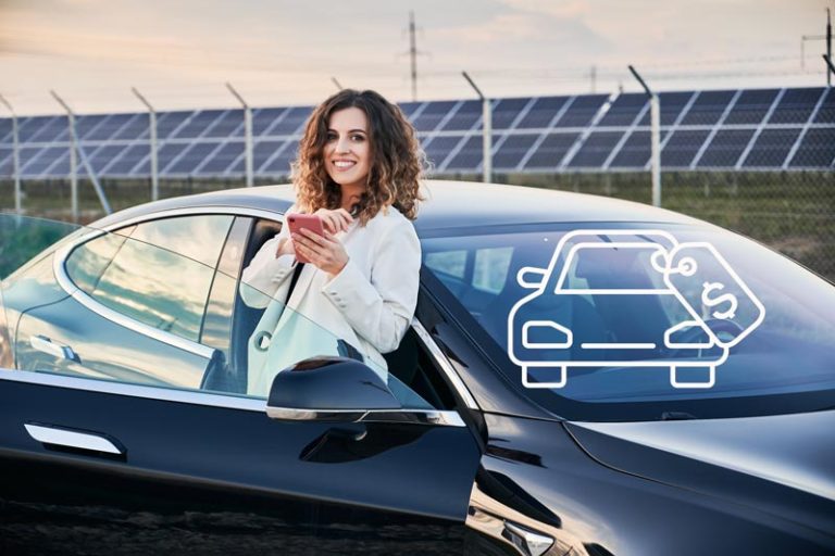 Buy-Used-Tesla---cheerful-woman-standing-by-car-and-using-smartphone