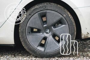 Do-Tesla-Tires-Wear-Out-Faster? Old Tesla Induction Wheels on a White Tesla