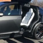 black-tesla-model-x-with-white-seats