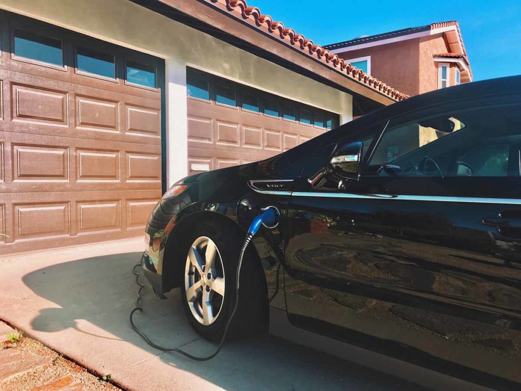 This-Is-Becoming-A-More-Common-Sight-Electric-Car-Charging-In-The-Driveway-Of-A-Home-In-A-San-Diego_Chevy-Volt